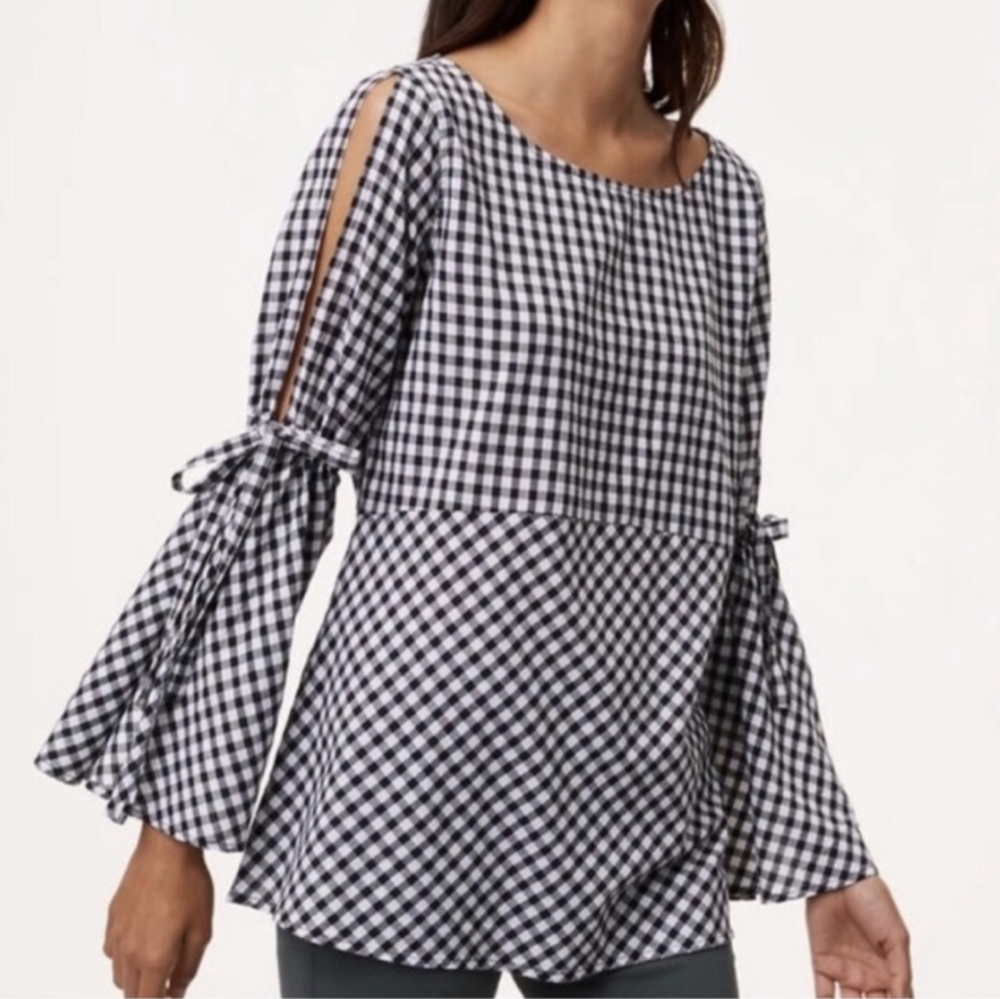 Cold shoulder top with side tie bell sleeves
